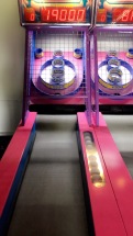 Uhm, so i love two games more than anything... skee ball and air hockey.. i will play anyone and CRUSH THEM. haha seriously, I will beat you and Monica Gellar dance in yo face!